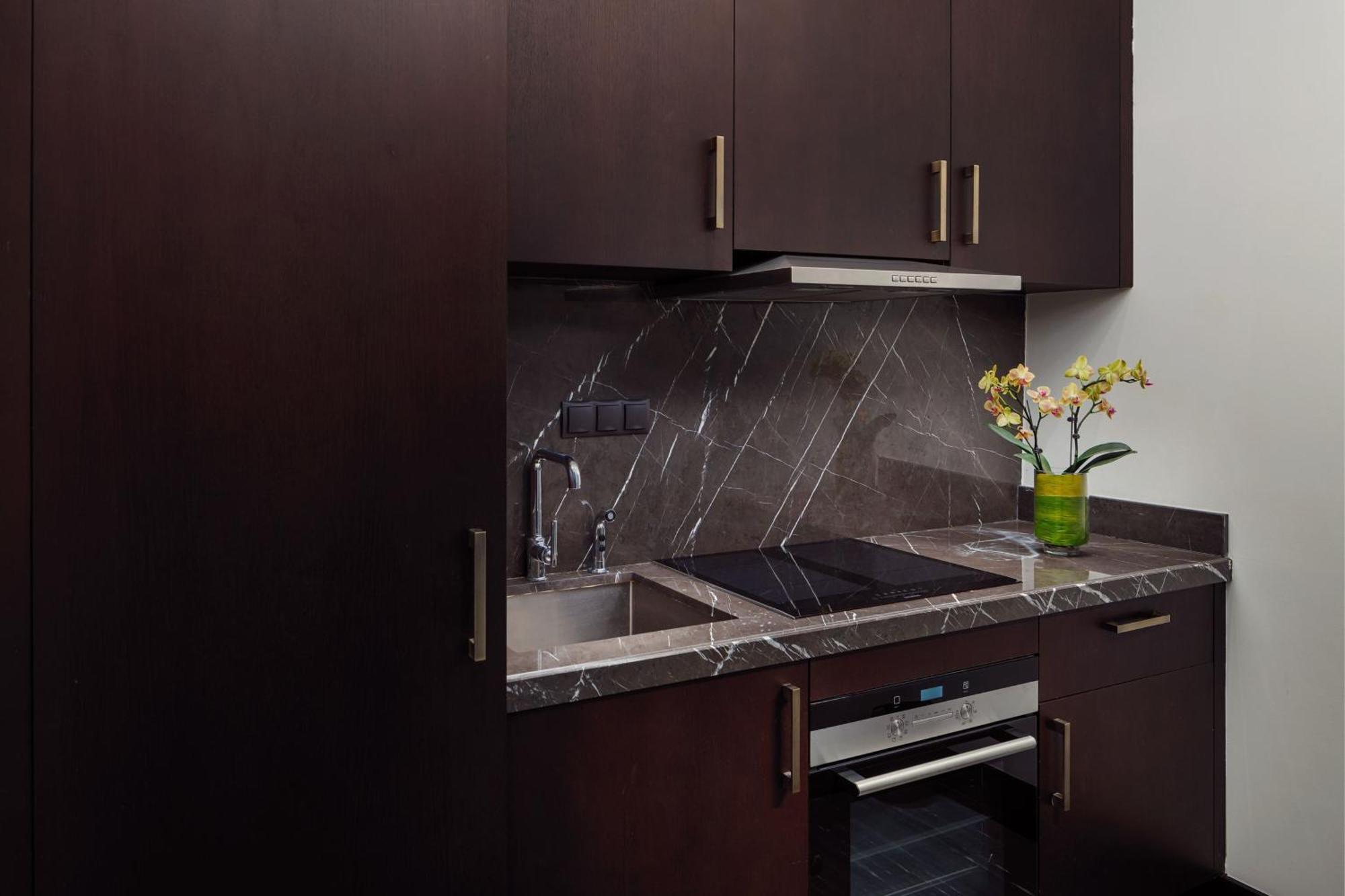 The St. Regis Astana Hotel Exterior photo A kitchen in a typical apartment
