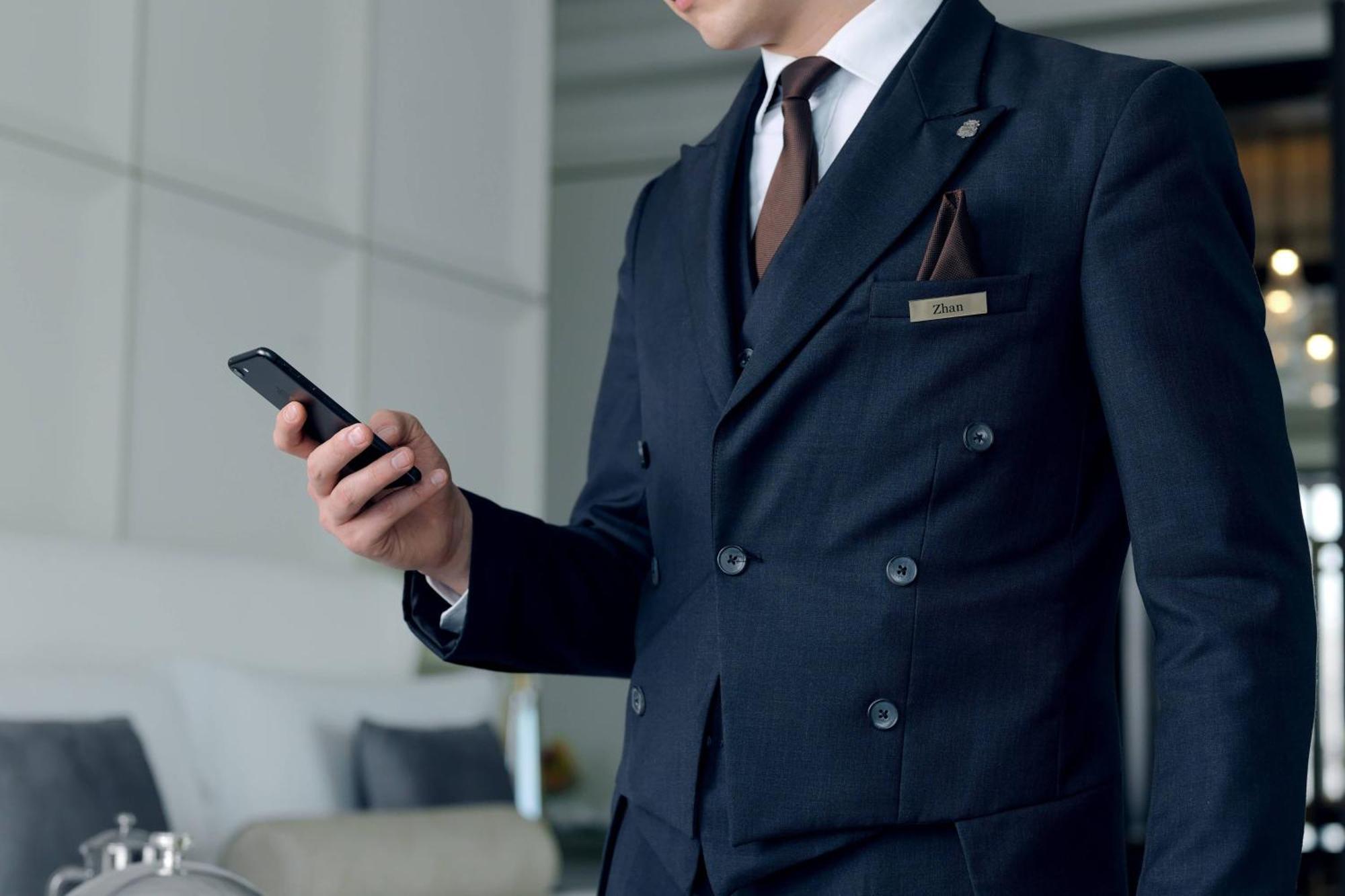 The St. Regis Astana Hotel Exterior photo A concierge