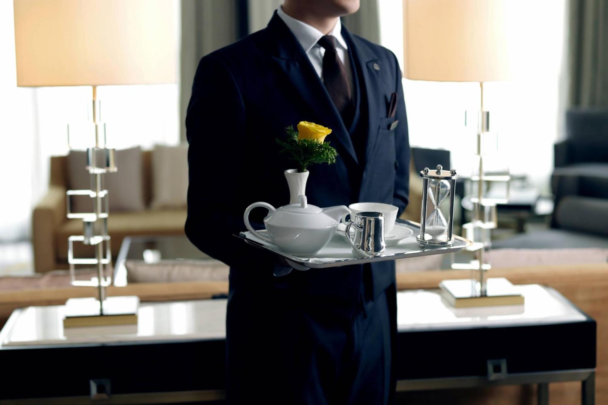 The St. Regis Astana Hotel Exterior photo A butler at the Four Seasons Hotel, Seoul
