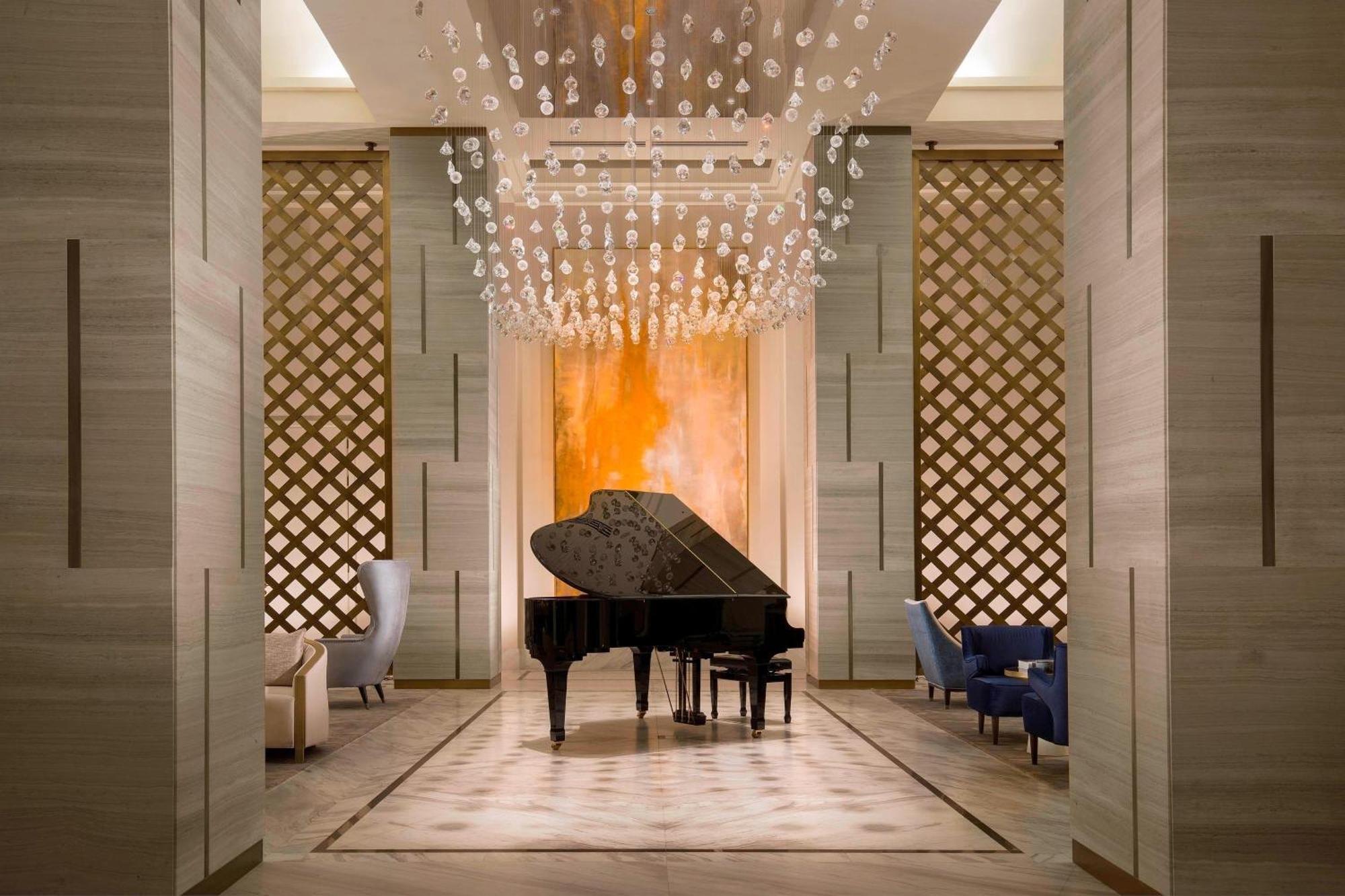 The St. Regis Astana Hotel Exterior photo The piano at the lobby